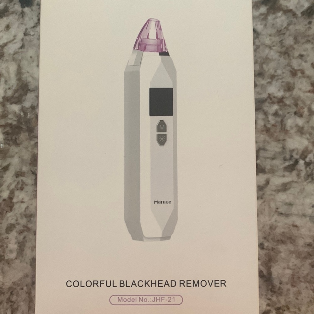 New with tags Blackhead remover vacuum with three care skin light